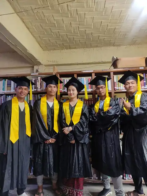 Graduates at library